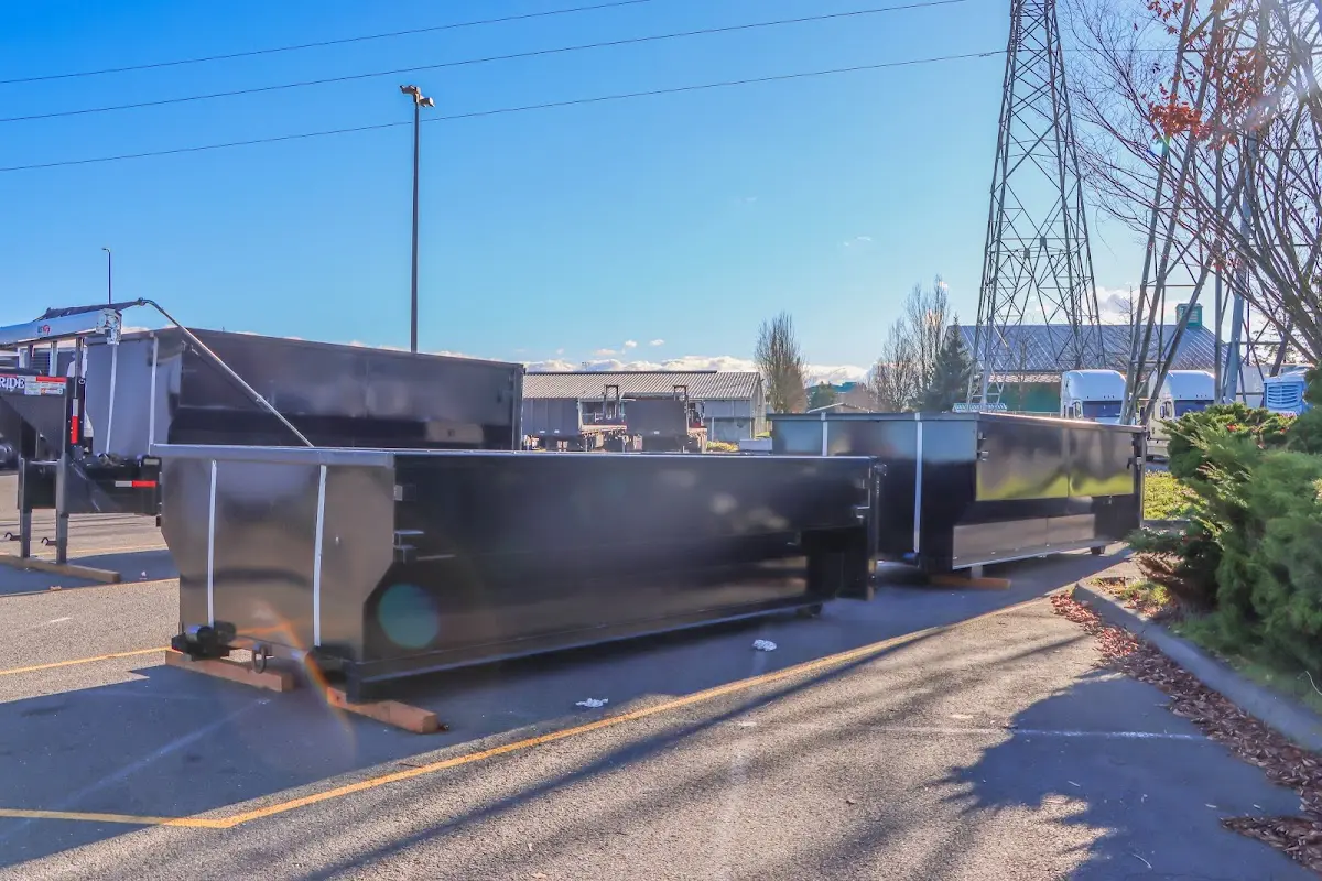 Roll-off dumpster ready for waste disposal at job site for 3 Yard Dumpster Rental in Temple